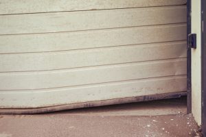 Top Signs You May Need New Garage Doors