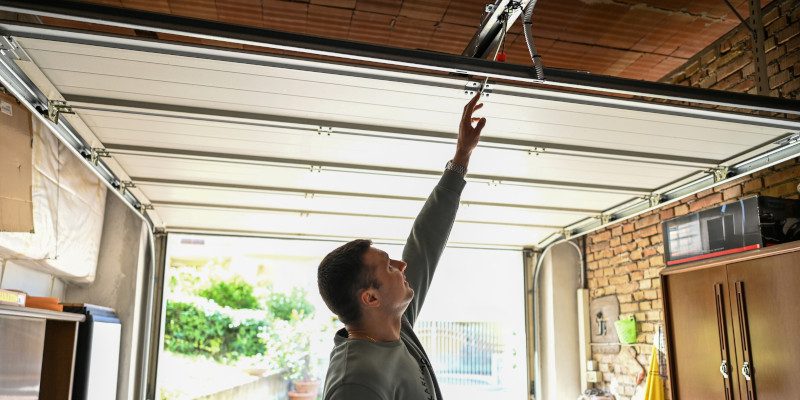 4 DIY Preventative Maintenance Tips to Protect Your Garage Doors
